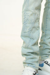 "LOVE IS PAIN" EMBOSSED SKINNY DENIM (LIGHT BLUE/SAND)