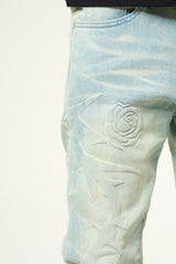 "LOVE IS PAIN" EMBOSSED SKINNY DENIM (LIGHT BLUE/SAND)