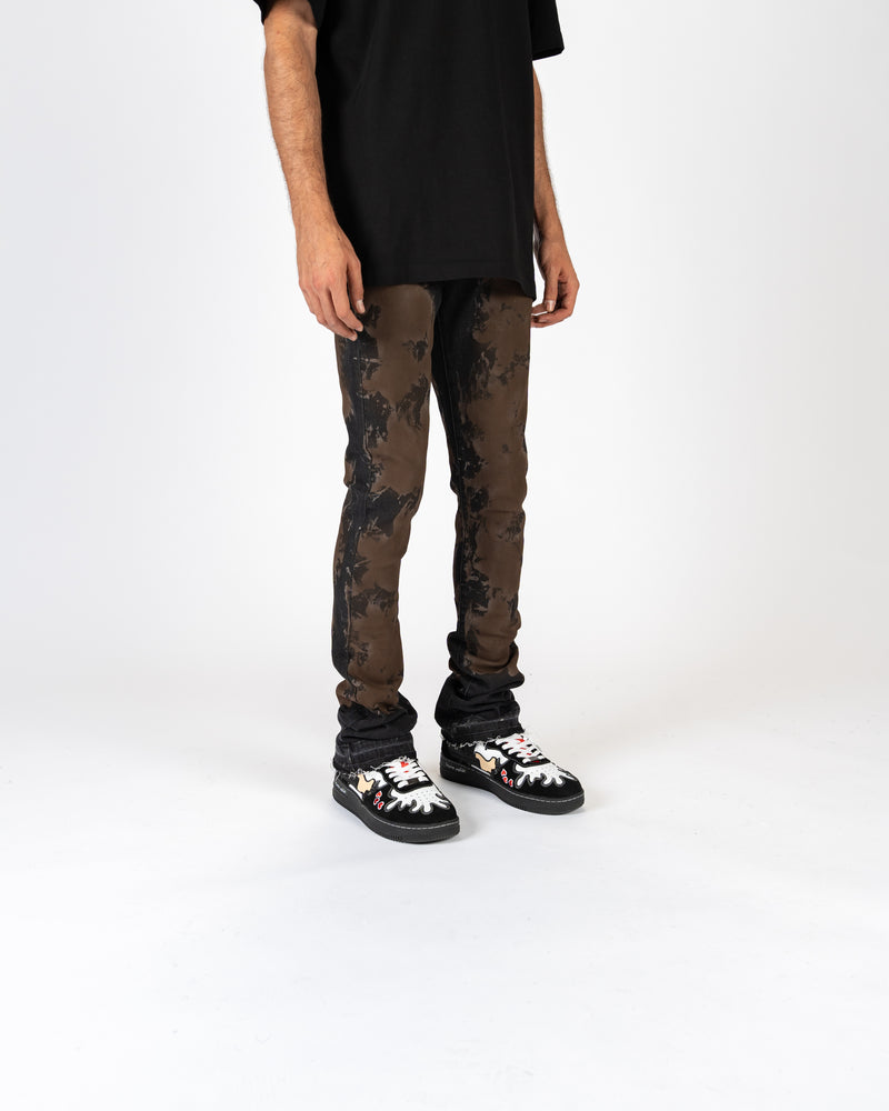 "SCARRED BY" FLARE STACK DENIM