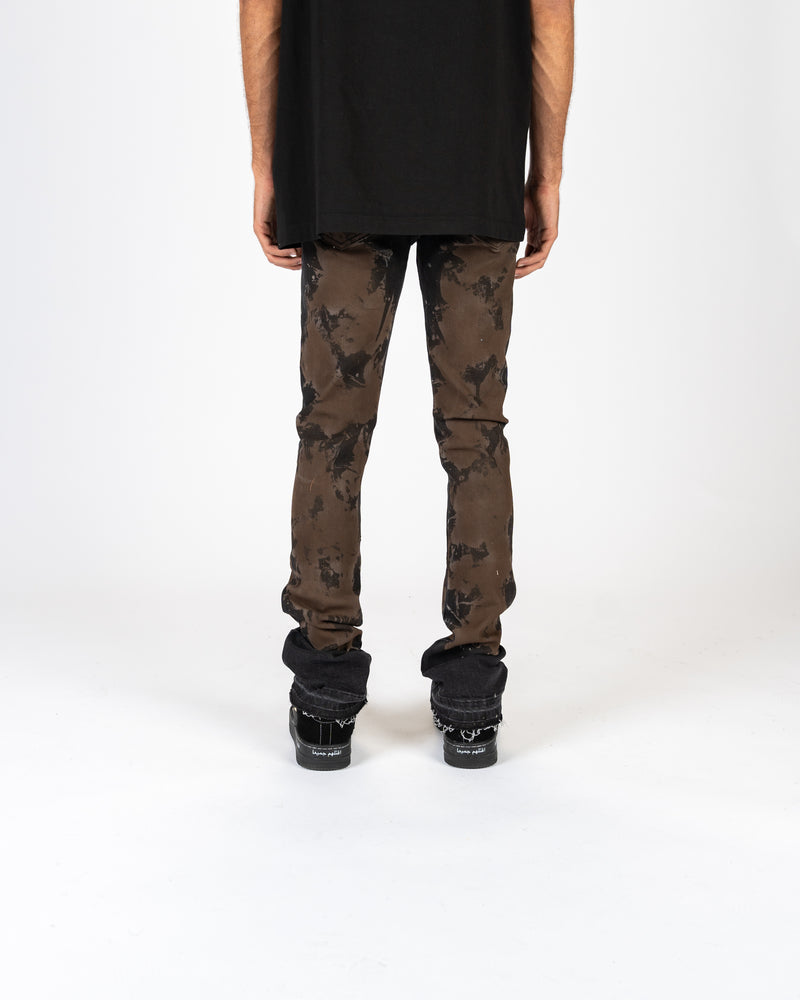 "SCARRED BY" FLARE STACK DENIM